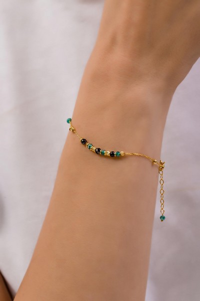 
	Gold Turquoise, Black Crystal and Dorica Bracelet, 